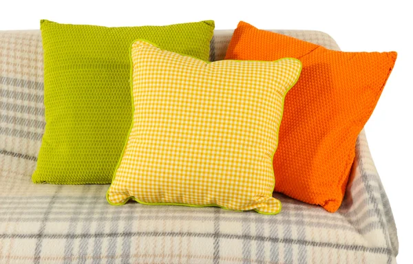 Colorful pillows on couch isolated on white — Stock Photo, Image