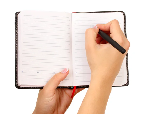Hand schrijven op notebook, geïsoleerd op wit Stockfoto