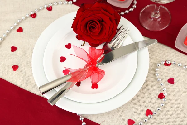 Table setting in honor of Valentine's Day close-up Royalty Free Stock Photos