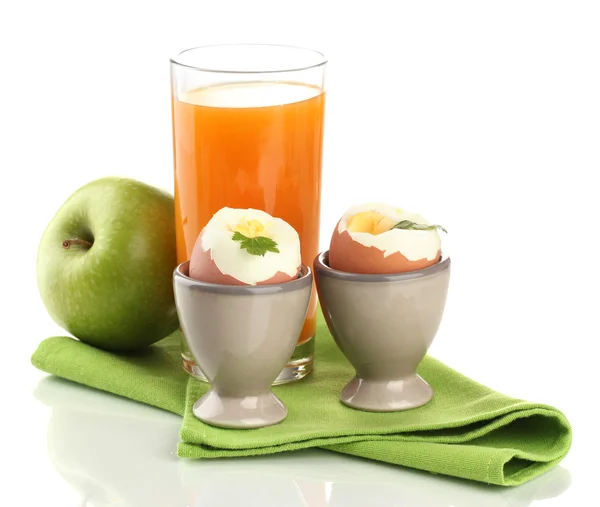 Light breakfast with boiled eggs and glass of juice, isolated on white — Stock Photo, Image