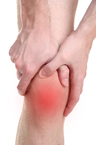 Man met zere knie, geïsoleerd op wit — Stockfoto