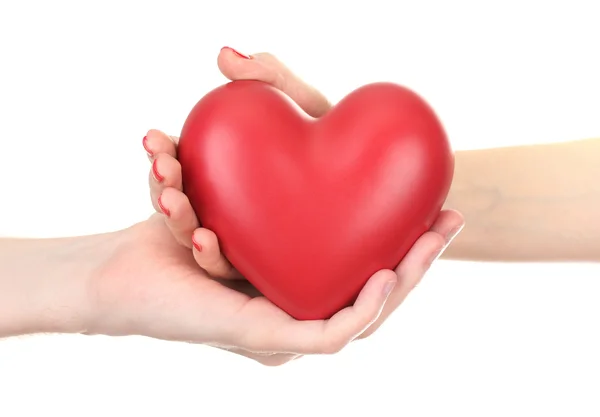 Red heart in woman and man hands, isolated on white — Stock Photo, Image