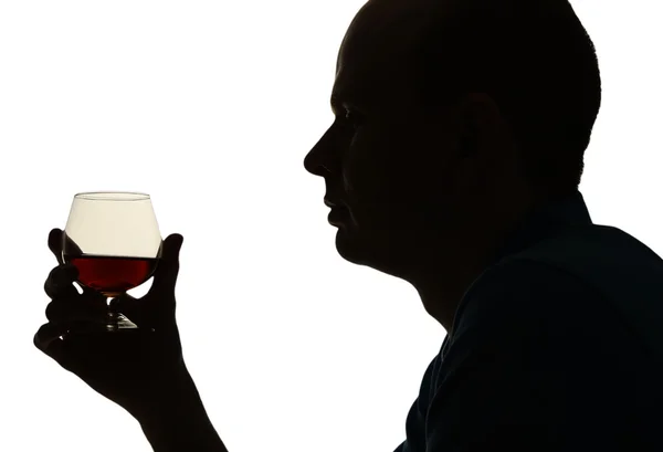 Silueta de hombre bebiendo alcohol, aislado sobre blanco —  Fotos de Stock