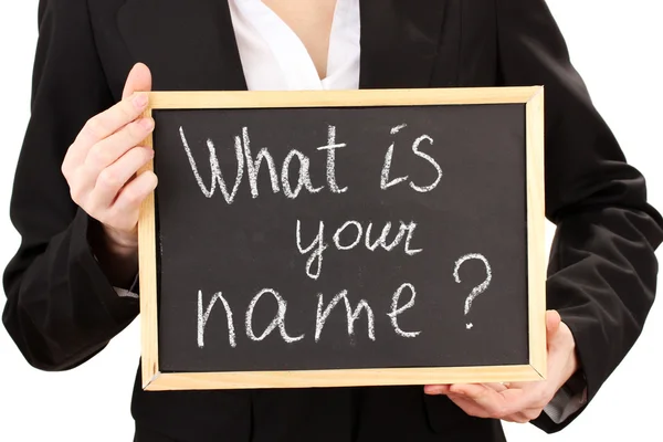 Young woman holding sign What is your name? — Stock Photo, Image