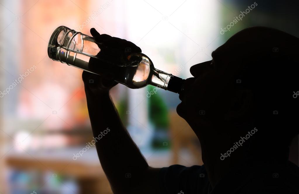 Silhouette of man drinking alcohol, close up Stock Photo by ©belchonock 20102695 Silhouette of man drinking alcohol, close up Stock Photo by ©belchonock 20102695