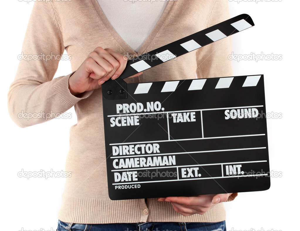 Movie production clapper board in hands isolated on white