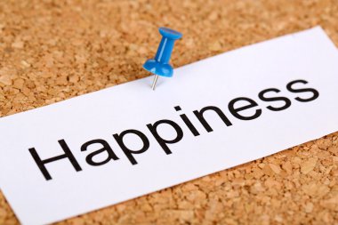 cork board üzerinde kelime mutluluk ile kağıt üzerinde itme