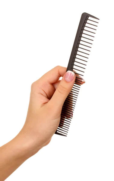 Black comb in female hand isolated on white — Stock Photo, Image