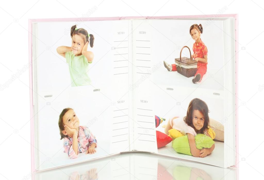 Open children photo album isolated on white