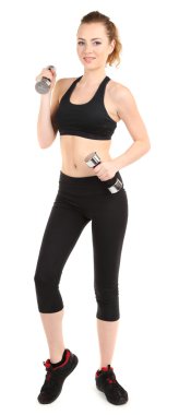genç bir kadın fitness egzersizleri üzerinde beyaz izole dumbbell ile yapıyor.
