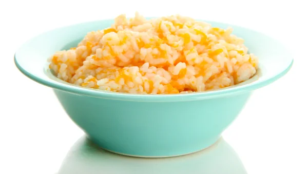 Taste rice porridge with pumpkin in blue bowl, isolated on white — Stock Photo, Image