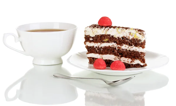A cup of tea and delicious cake isolated on white — Stock Photo, Image