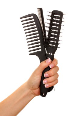 beyaz izole kadın elinde üç taraklar