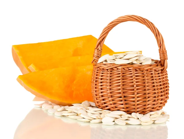 Pumpkin seeds in wicker basket, isolated on the white — Stock Photo, Image