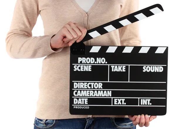 Film üretim clapper tahta üzerinde beyaz izole ellerinde