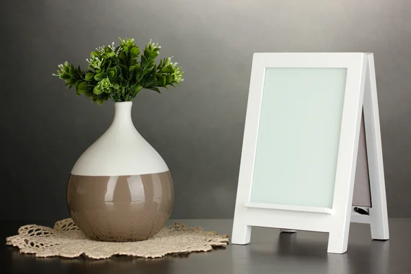 White photo frame for home decoration on grey background — Stock Photo, Image