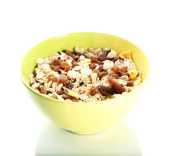 Delicious and healthy muesli in bowl isolated on white — Stock Photo, Image