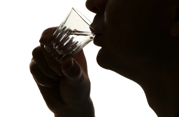 Silhouet van man drinken van alcohol, geïsoleerd op wit — Stockfoto