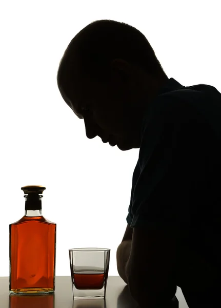 Silhouette of man with bottle of alcohol, isolated on white — Stock Photo, Image