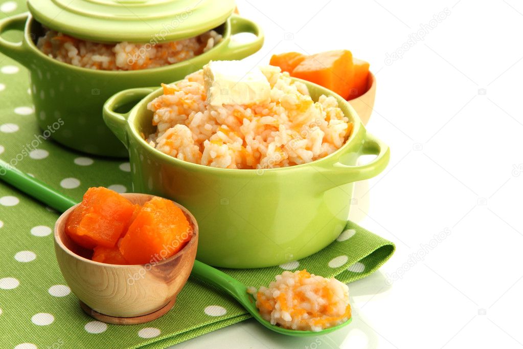 Taste rice porridge with pumpkin in saucepans, isolated on white