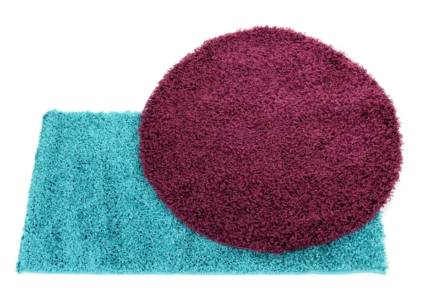 Dos alfombras de color aisladas en blanco — Foto de Stock