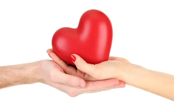 Red heart in woman and man hands, isolated on white — Stock Photo, Image