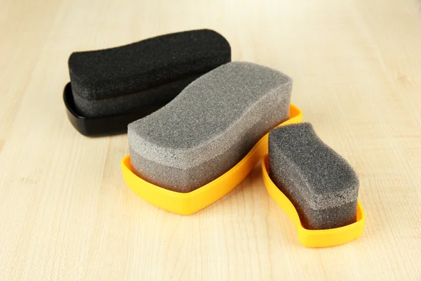 Shoe shine sponges, on wooden background — Stock Photo, Image