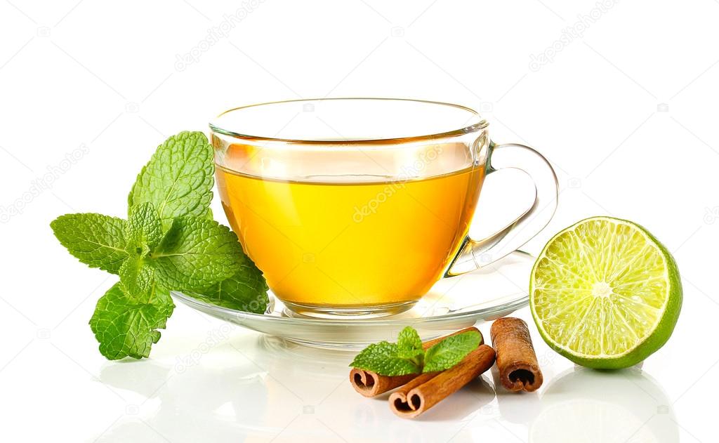 Cup of tea with mint,cinnamon and lime isolated on white