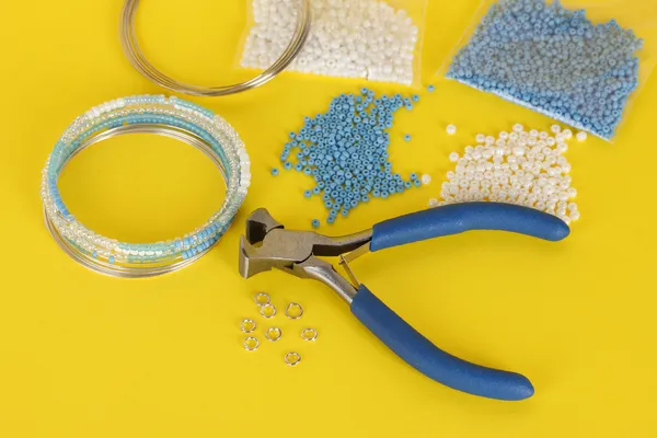 Set for needlework on yellow background — Stock Photo, Image