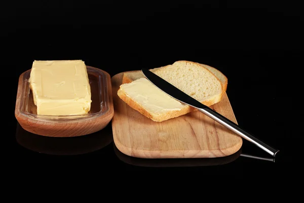 Pão com óleo vegetal isolado em preto — Fotografia de Stock