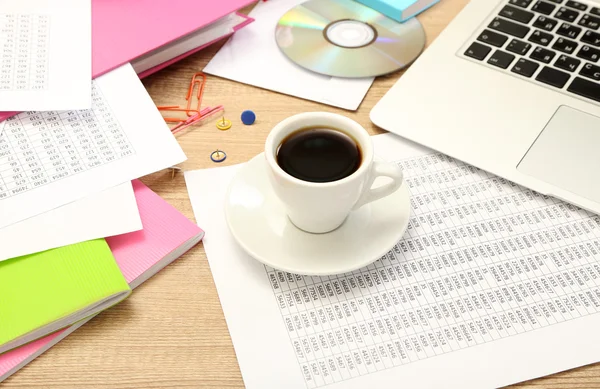 Cup of coffee on office desktop close-up — Stock Photo, Image