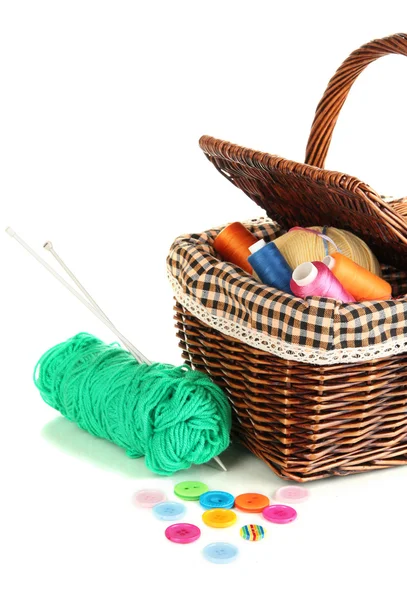 Wicker basket with accessories for needlework isolated on white — Stock Photo, Image