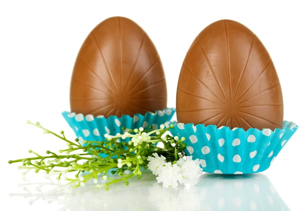 Chocolate eggs in napkin isolated on white — Stock Photo, Image