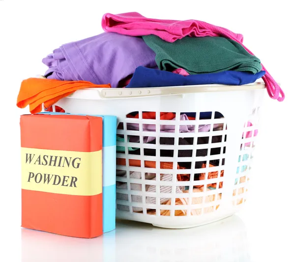 Clothes with washing powder in plastic basket isolated on white — Stock Photo, Image