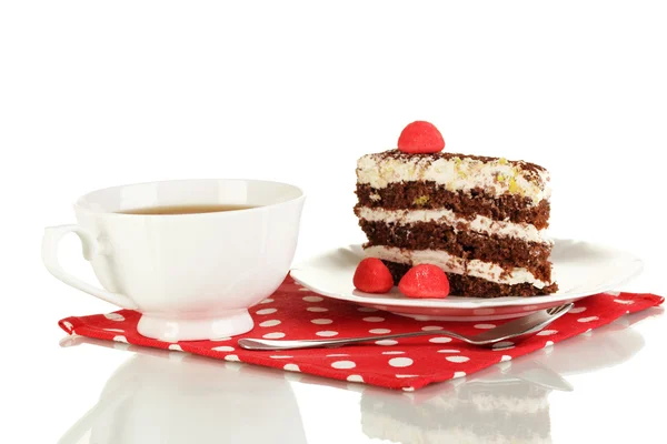 A cup of tea and delicious cake isolated on white — Stock Photo, Image