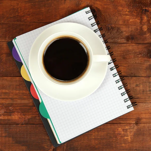 Cup of coffee on worktable close up — Stock Photo, Image