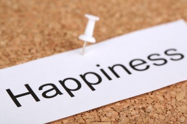 cork board üzerinde kelime mutluluk ile kağıt üzerinde itme