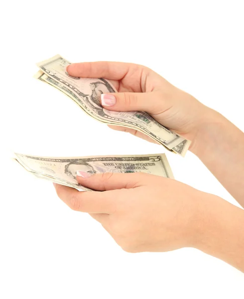 Женщина пересчитывает доллары, крупным планом, изолированные на белом — стоковое фото