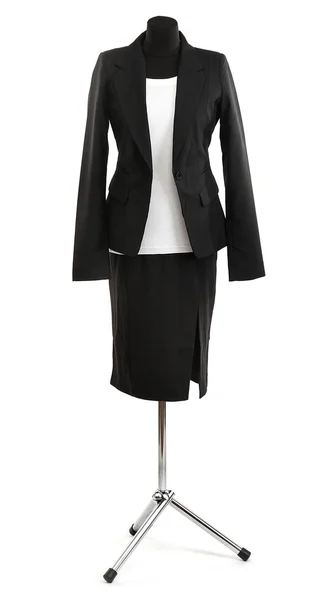 White blouse and black skirt with coat on mannequin isolated on white — Stock Photo, Image