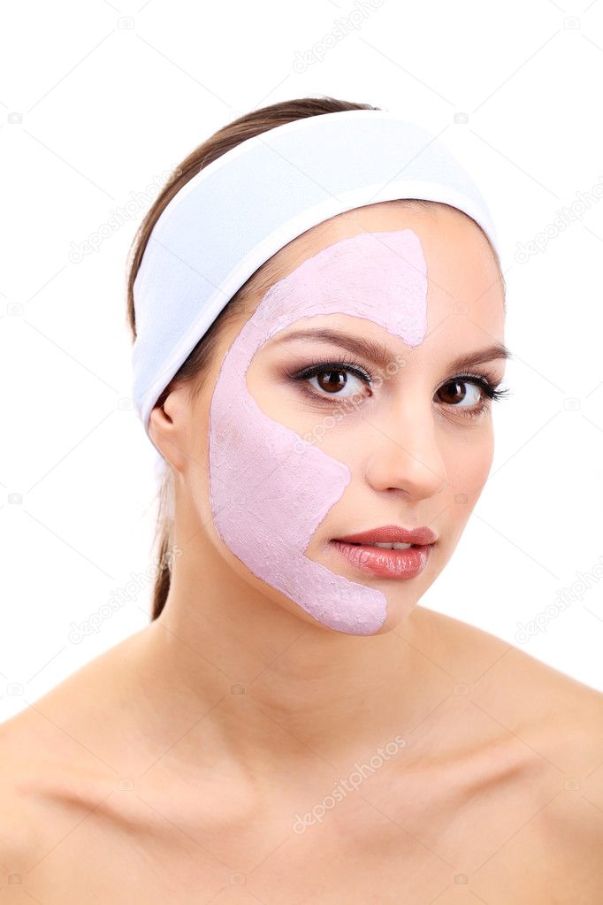 Young woman with clay facial mask, isolated on white