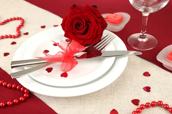 Table setting in honor of Valentine's Day close-up Stock Photo