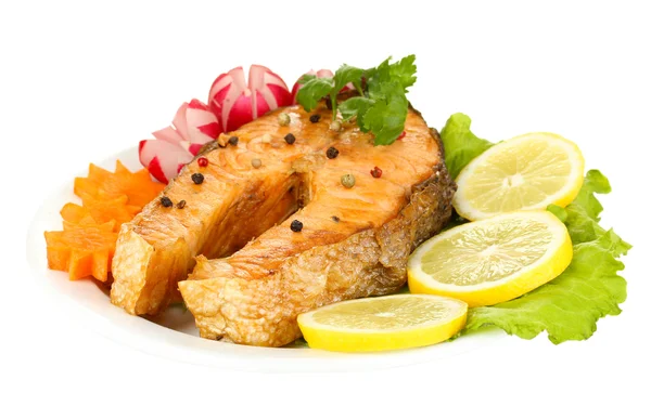 Appetizing grilled salmon with lemon and vegetables isolated on white — Stock Photo, Image