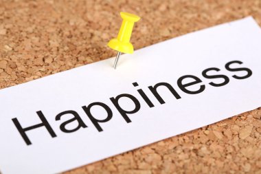 cork board üzerinde kelime mutluluk ile kağıt üzerinde itme