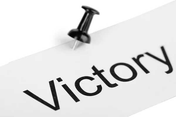 Push pin on paper with word victory written on it isolated on white — Stock Photo, Image