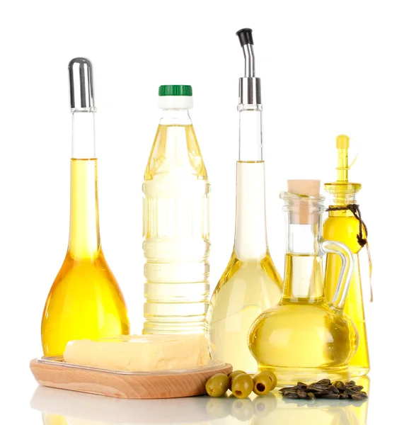 Diferentes tipos de aceite con semillas de girasol y aceitunas aisladas en blanco —  Fotos de Stock