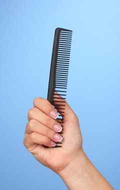 el renk arka plan üzerinde siyah tarak