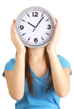 Kız holding saatin üzerinde beyaz izole yüz üzerine