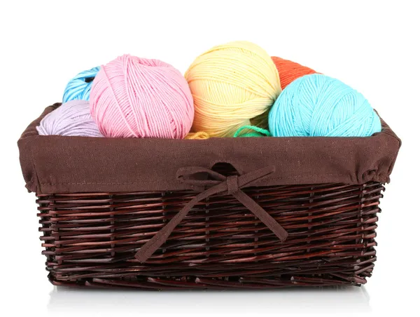 Colorful yarn balls in wicker basket isolated on white — Stock Photo, Image