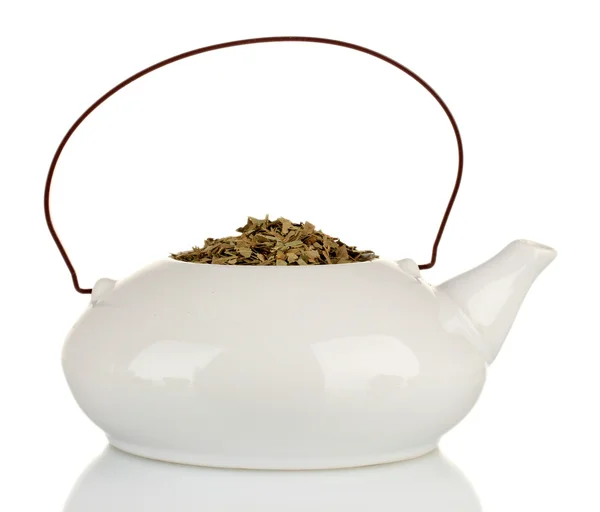 Dried herbs in teapot, isolated on white. Conceptual photo of herbal tea. — Stock Photo, Image