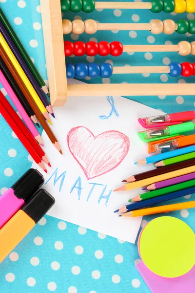 Toy abacus, note paper, pencils on bright background — Stock Photo, Image